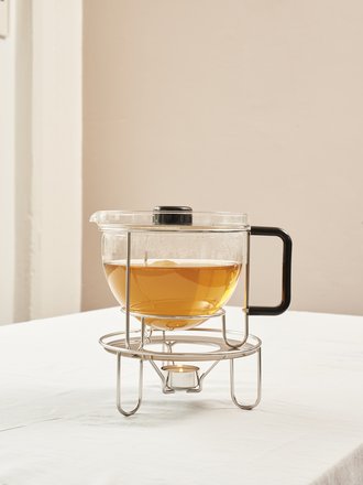 Foto der Mono Teekanne »Classic« mit einem Stövchen