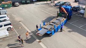 Anlieferung des Trägers auf dem VTE-Parkplatz