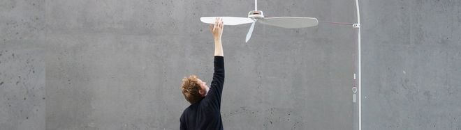 Illustration of a student's work: very large ceiling fan touched by a person