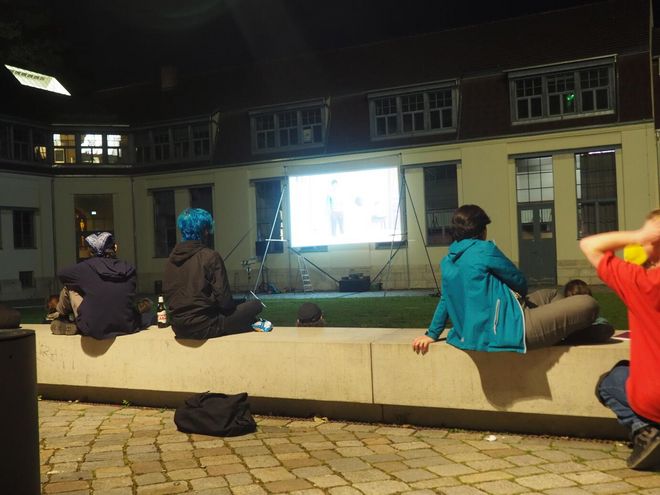 Open-air cinema on the lawn in front of the Van de Velde Building