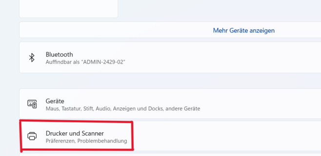 Under "Bluetooth and Devices," select "Printers and Scanners."
