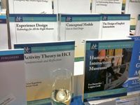 photo of series of books, including ours 