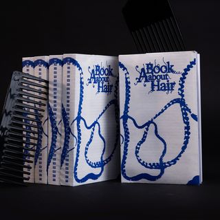 Photo of a stack of the publication with a comb
