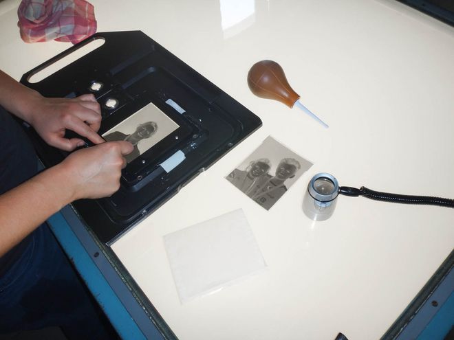 First the negative is cleaned.