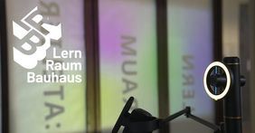 logo of Bauhaus Learning Space, in the background one can see the learning space