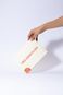 Product view of »RED AF* – Red Asian Flush« by Soo Ah Youn and Anastasia Fast: a hand holds a closed book titled »RED ASIAN FLUSH«. The illustrated character »Blush« peeks out from the lower edge.