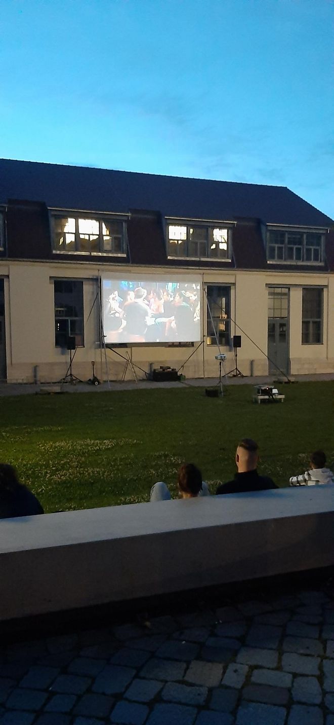 Open-air cinema on the lawn in front of the Van de Velde Building