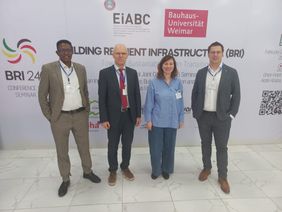 Prof. Hans-Joachim Bargstädt (zweiter von links), Jun.-Prof. Anastasia Athanasiou und Prof. Jürgen Melzner (v.ln.r.) hielten Vorträge auf der Konferenz in Addis Abeba. Foto: Professur Baubetrieb und Bauverfahren. Prof. Hans-Joachim Bargstädt (zweiter von links), Jun.-Prof. Anastasia Athanasiou und Prof. Jürgen Melzner (v.ln.r.) hielten Vorträge auf der Konferenz in Addis Abeba. Foto: Professur Baubetrieb und Bauverfahren.