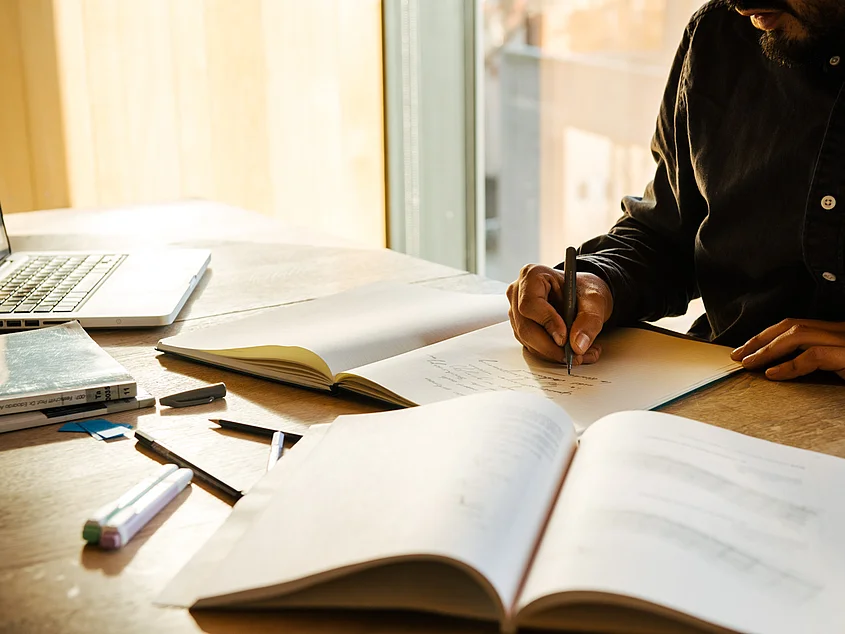 A student doing research in the library