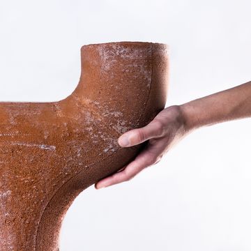 Detail of the seating furniture with hand 
