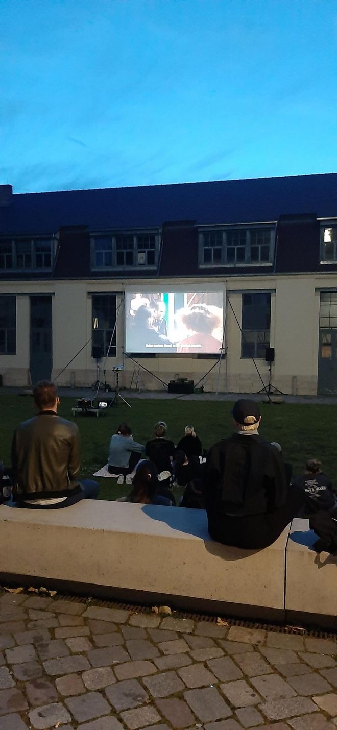 Open-air cinema on the lawn in front of the Van de Velde Building