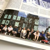 Detail of the page with group photo from the project