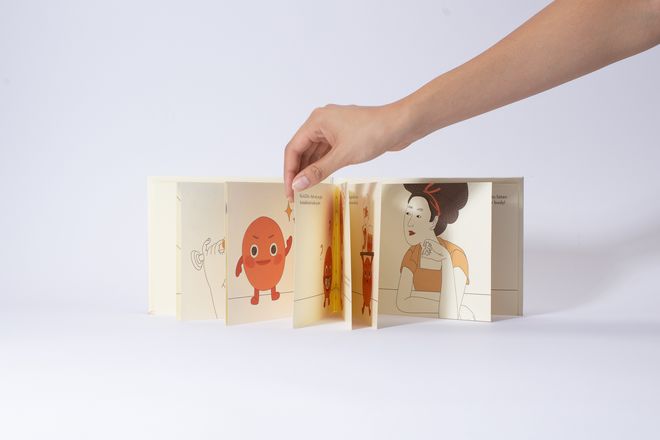 Book view of »RED AF* – Red Asian Flush« by Soo Ah Youn and Anastasia Fast: a leporello is unfolded, showing several illustrated scenes with the character »Blush« and a protagonist.