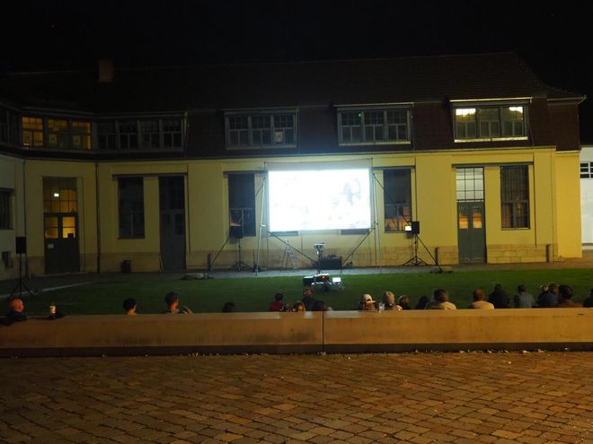 Open-air cinema on the lawn in front of the Van de Velde Building