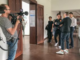 ZDF-filming team and host Jo Schück in the Main Building of Bauhaus-Universität Weimar filming in the Main Building