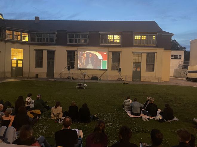 Open-air cinema on the lawn in front of the Van de Velde Building