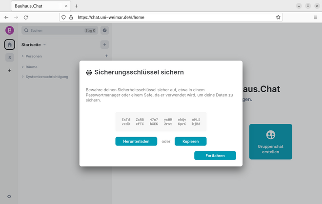 Screenshot des Dialogfeldes Sicherungsschlüssel sichern. Es wird ein Sicherheitsschlüssel angezeigt, zusammen mit den Optionen "Herunterladen" und "Kopieren". Darunter befindet sich der Button "Fortfahren". 