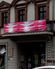 A banner on the balcony of a building
