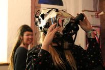A visitor testing the EyeSect wearable.