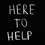 Auf einer Tafel steht geschrieben »Here to Help«