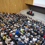 Dr. Simon Frisch, Vice President of Student and Academic Affairs, welcomes first-year students at the Matriculation Ceremony in the Audimax. Photo: Bauhaus-Universität Weimar/ Thomas Müller