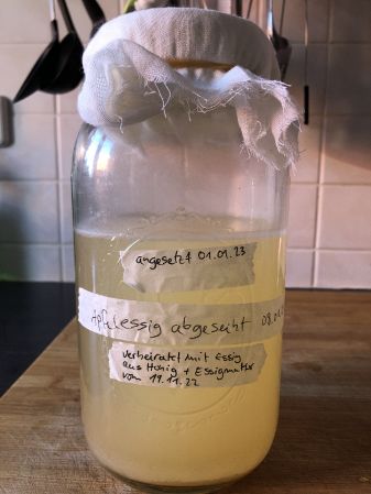 jar with wild fermented apple vinegar