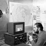 U.S. Navy Chief Petty Officer Adrey Garret uses a ham radio at Williams Air Operating Facility during the 1956 winter. Ham radio was the only means of voice communication with friends and family back in the U.S. for navy personnel living and working in Antarctica in the days before satellite telephone technology became common.