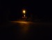 [Daniel Wanzek] Der Überweg ist nur schwach ausgeleuchtet. Die Laternen befinden sich hinter den Verkehrszeichen & diese liegen im Dunkeln.